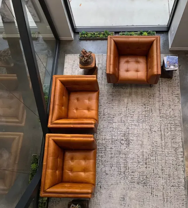 Cognac leather armchairs in a reception area